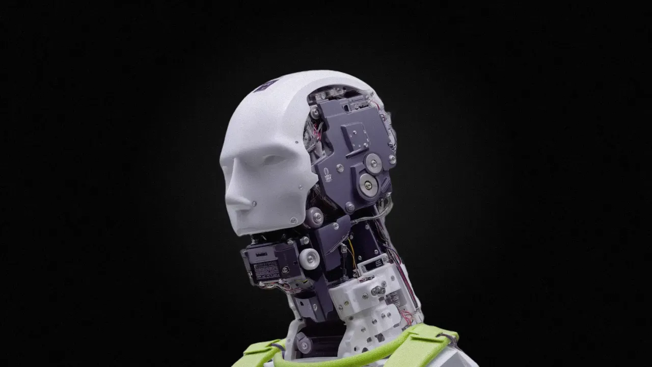 Advanced humanoid robot with exposed mechanical components against a black background